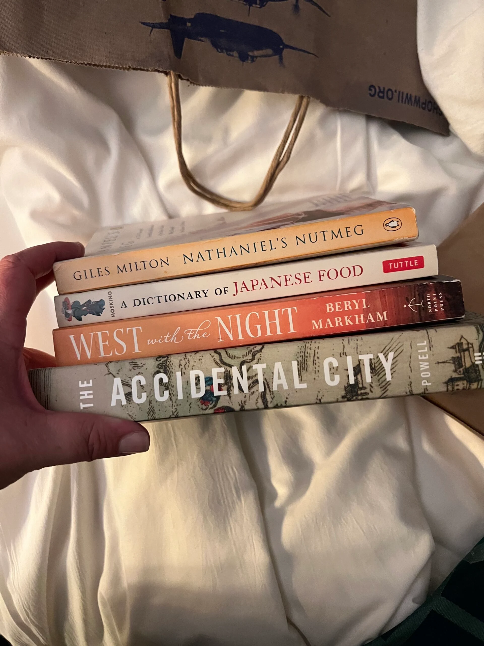 stack of books displayed with bindings up