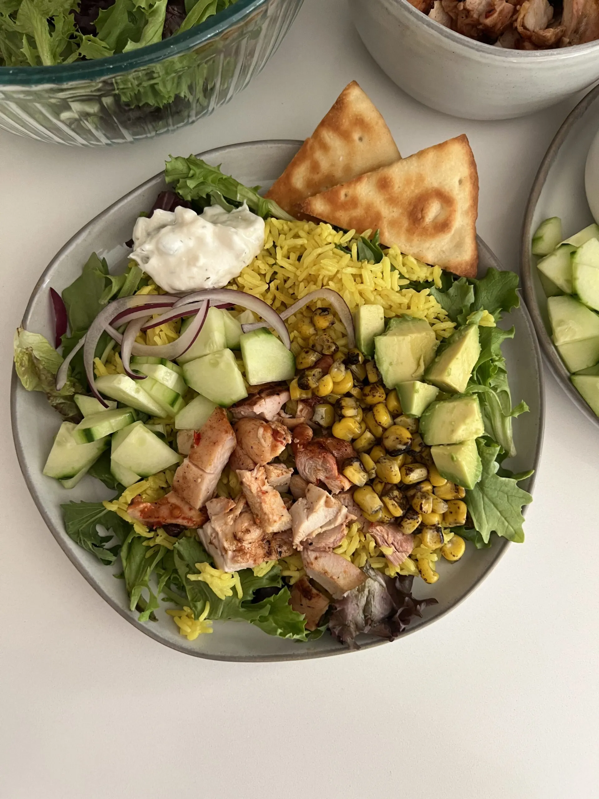 Harissa Honey Grilled Chicken in a Cava style bowl
